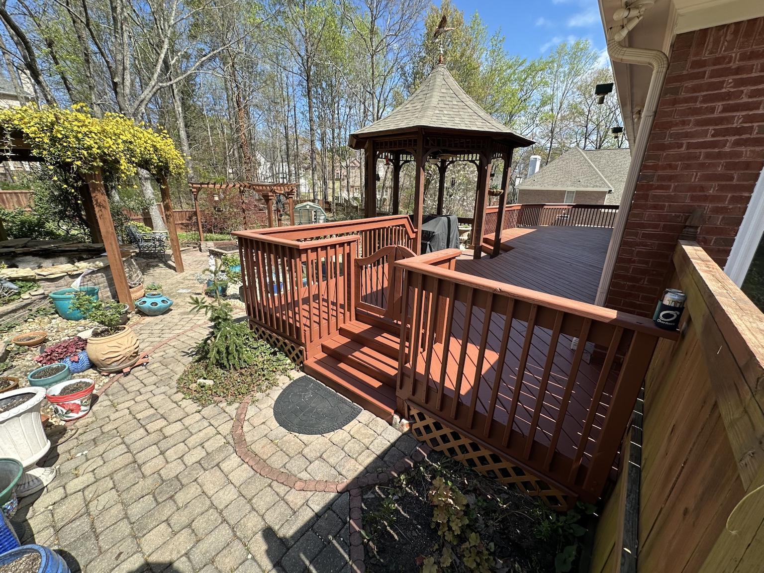 Finished residential deck and exterior renovation — view 2
