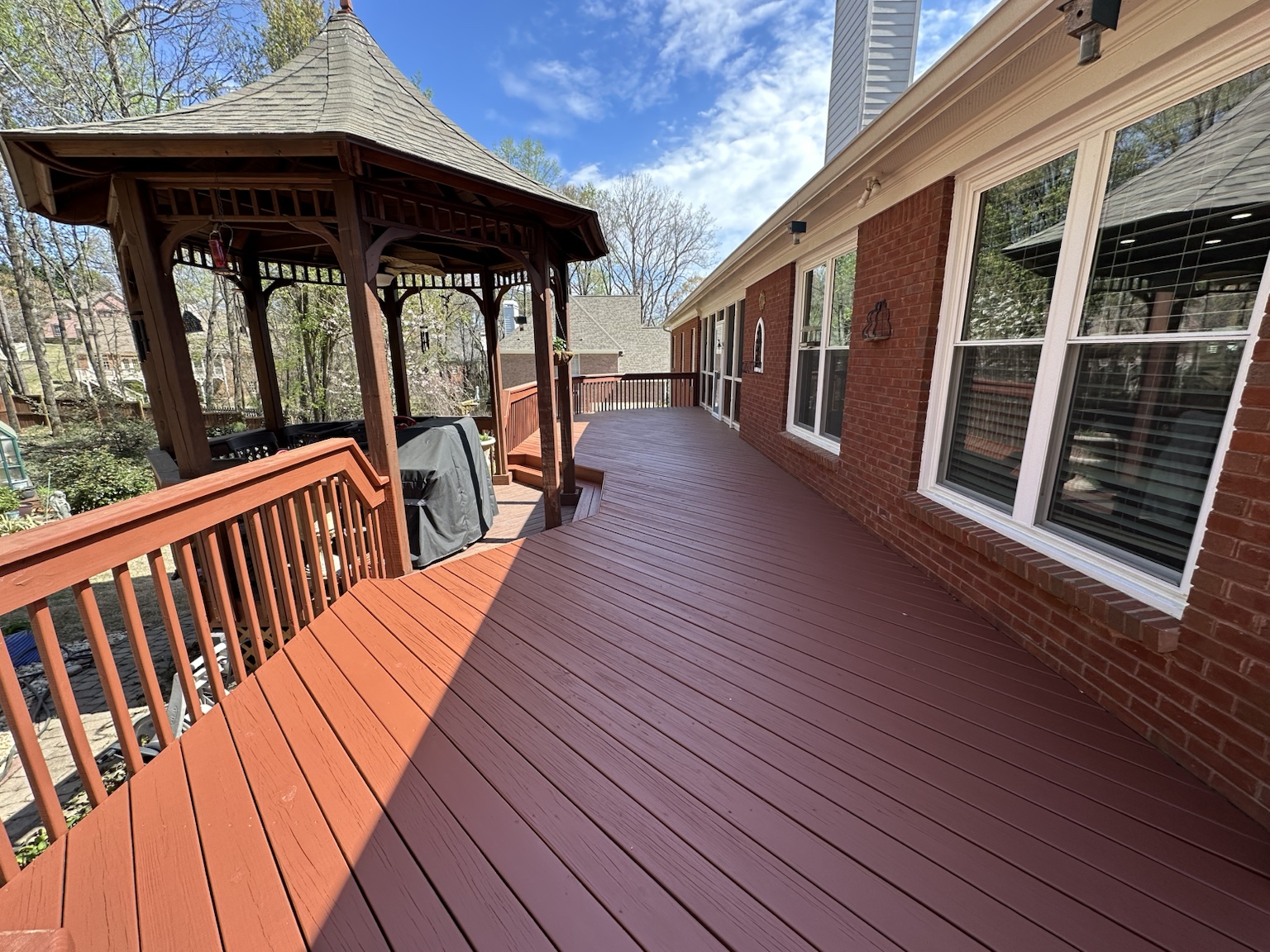Finished residential deck and exterior renovation — view 4